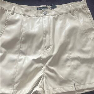 PrettyLittleThing Cream High-Waist Faux Leather Shorts with Belt Loops